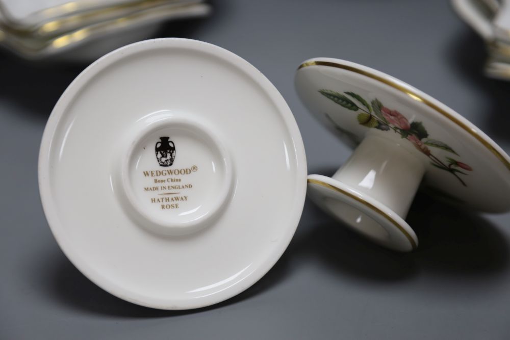 Set of six Royal Crown Derby porcelain dishes signed Garnett, six Wedgwood scallop shell dishes and a pair of dwarf candlesticks.